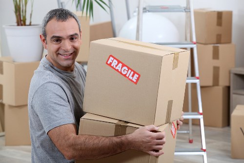 Loading furniture and boxes into a removal van