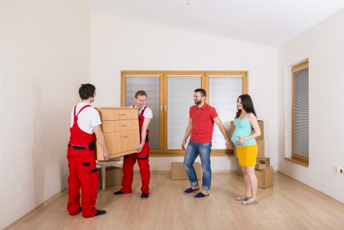 House movers helping a family home move in Longford