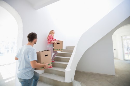 Professional moving team handling household items in Longford